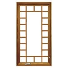 Victorian Tall, narrow brown wood-framed window with decorative grid muntins around a central glass pane and bottom latch.