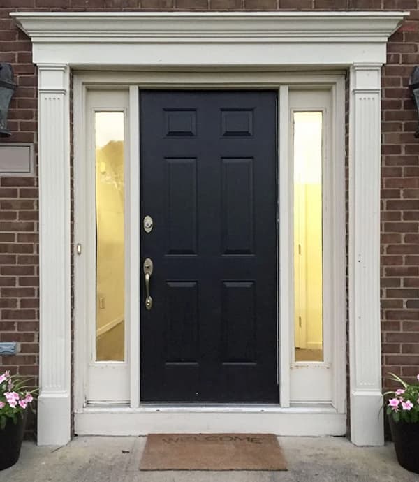 Outdated front door of Grove City home.