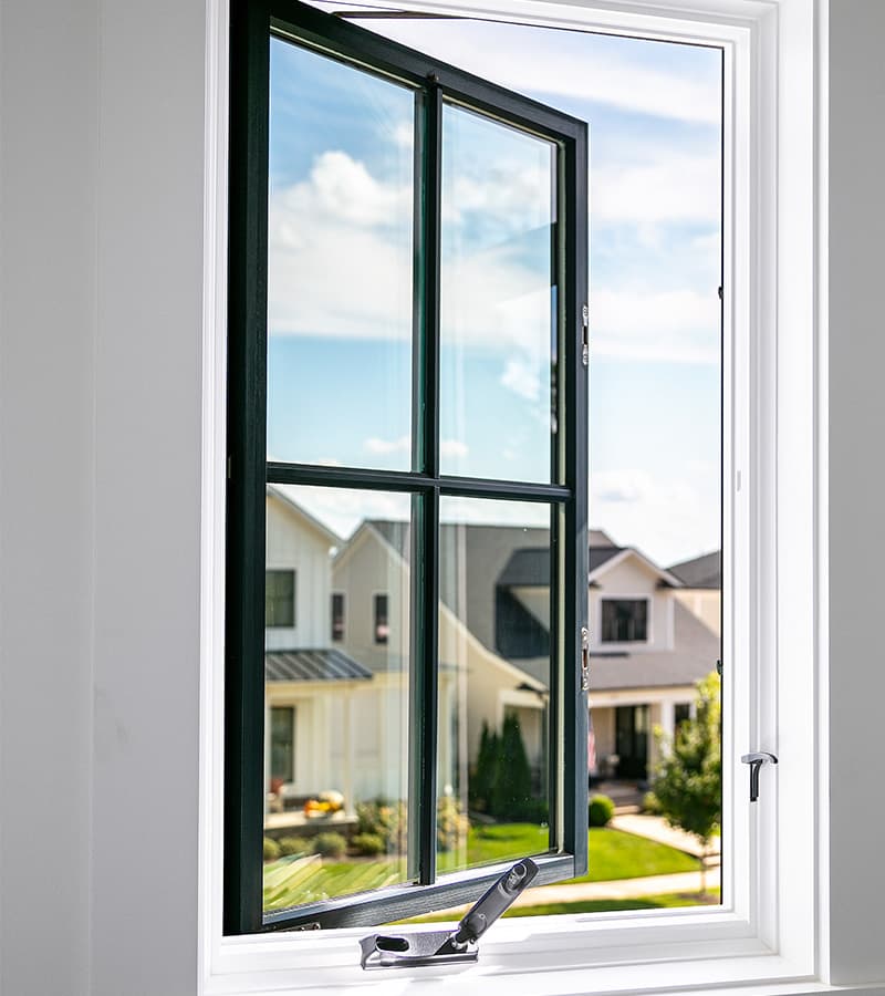 a single large black casement window with a chrome crank