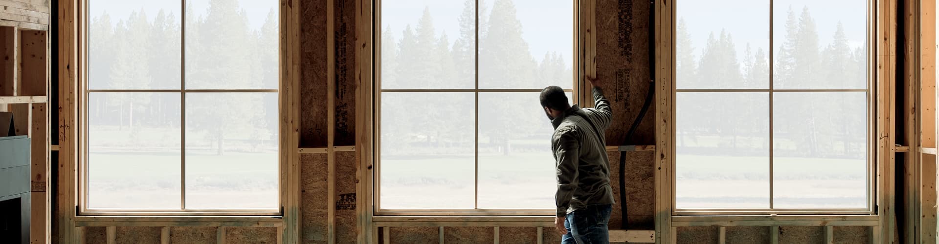the pella sticker on a new window in a home under construction