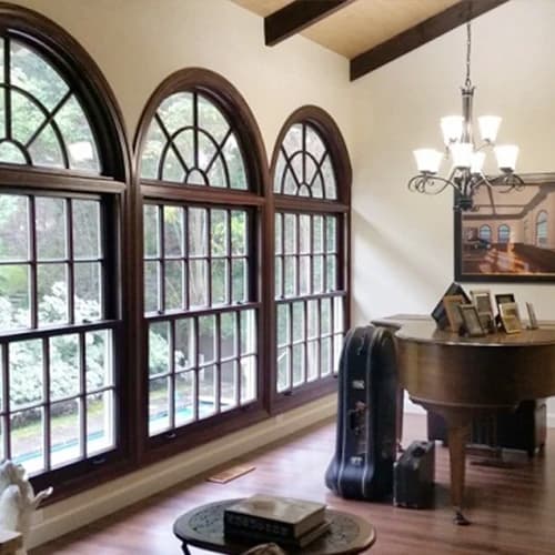 Wood Windows Custom Crafted To Match Favorite Painting Interior view of San Jose home in custom arched double-hung windows.