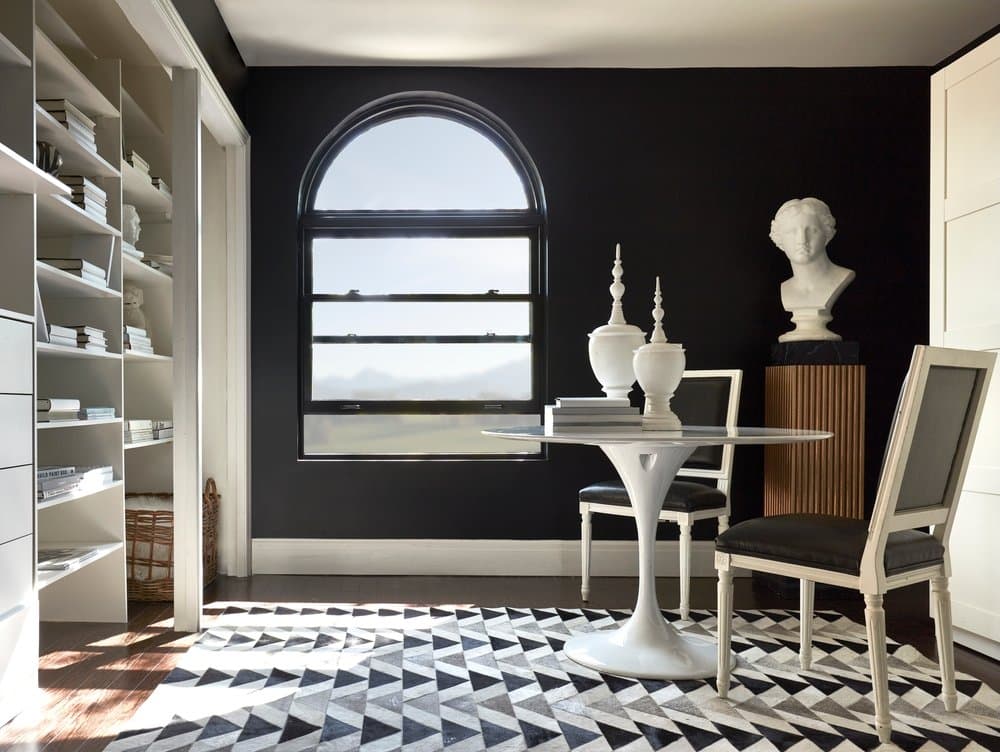 Stylish & Convenient Window Design With Retractable Screen Modern home office with dark walls and an open double-hung window with half circle window above