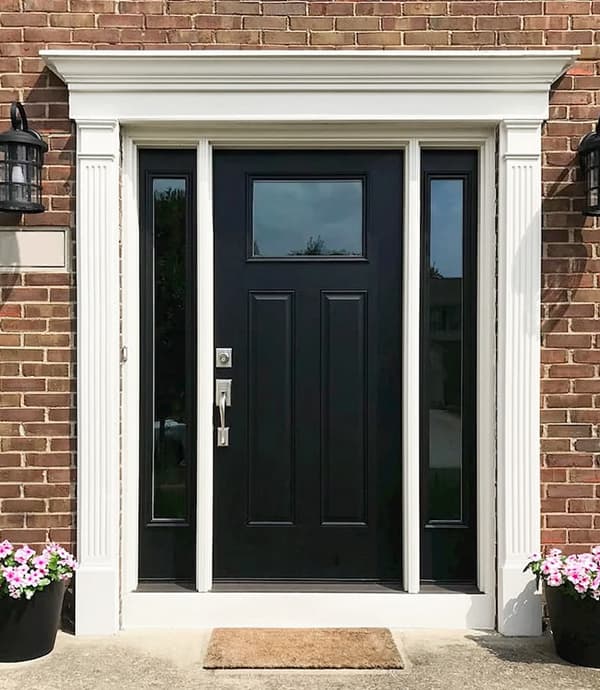 Newly installed fiberglass black door replacement on Grove City home.
