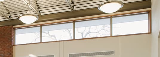interior of an elementary school with a horizontal ribbon of windows