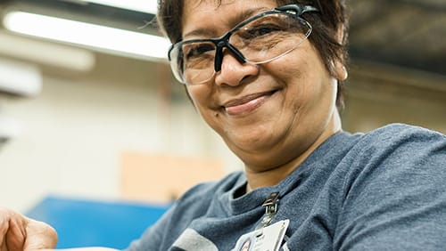 pella factory employee woman